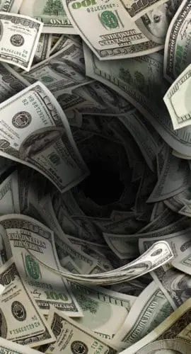 A swirling vortex surrounded by numerous U.S. dollar bills.
