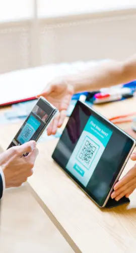 Close up of scanning QR for registration.