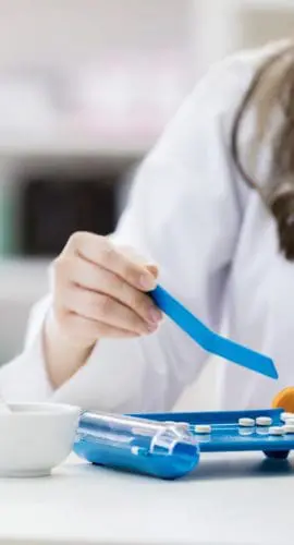 Pharmacist counts out pills