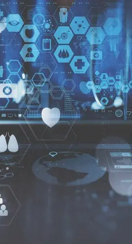 Hands are interacting with a futuristic digital interface showing healthcare and medical symbols and data visualizations.