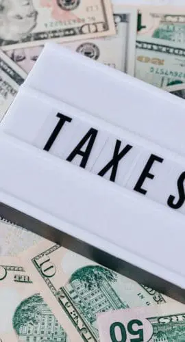 Quote board on top of cash bills