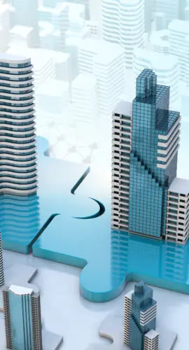 Business professionals reviewing documents during a merger and acquisition meeting involving sale-leaseback transactions