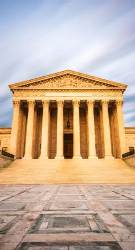 United States Supreme Court Building in Washington DC, USA at dusk.