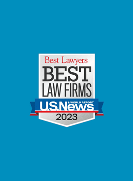 A badge on a blue background that reads "Best Lawyers, BEST LAW FIRMS, U.S. News & World Report, 2023".